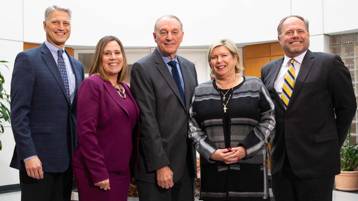 Barbara A. Papitto ’83, ’85 MBA, ’97H, second from right, with leaders from Bryant University.