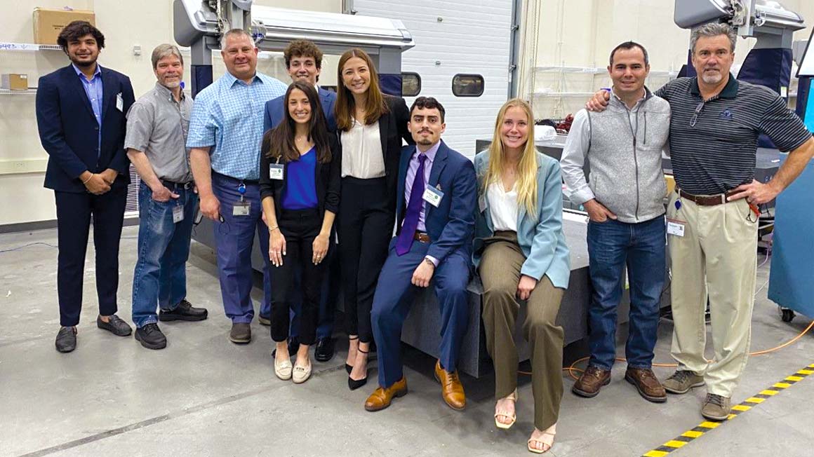 Spring 2021 student team poses for photo with Hexagon employees at the global company's local office