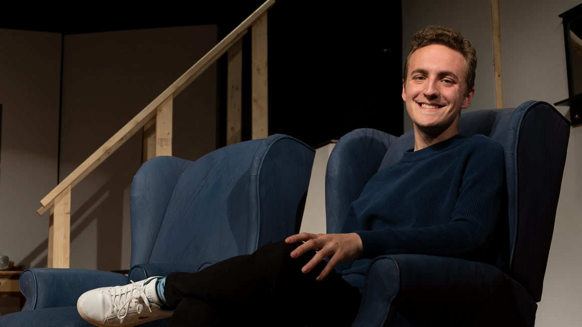 Bryant student Joey Leszczynski on the set of the Bryant Players production of "Rumors."