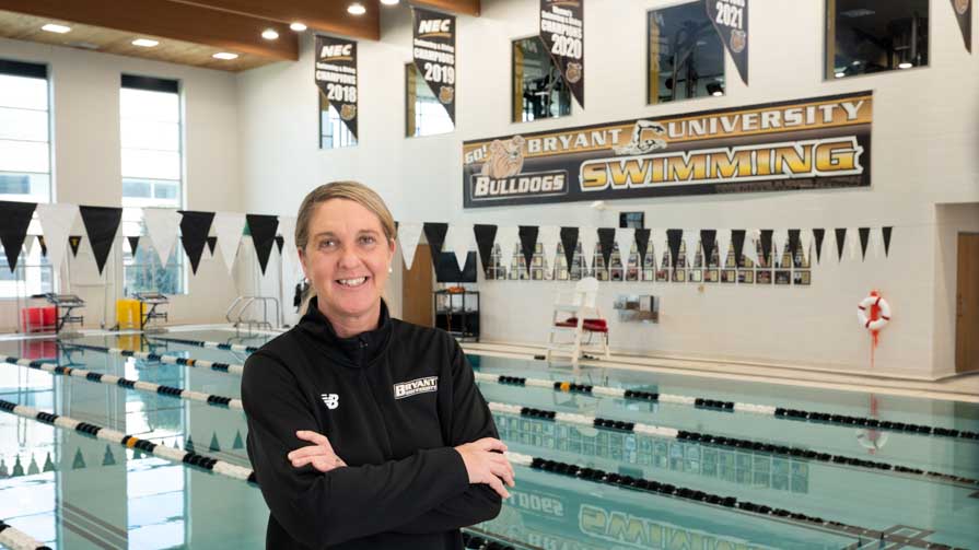 Bryant Swimming and Diving Coach Katie Cameron at university pool.