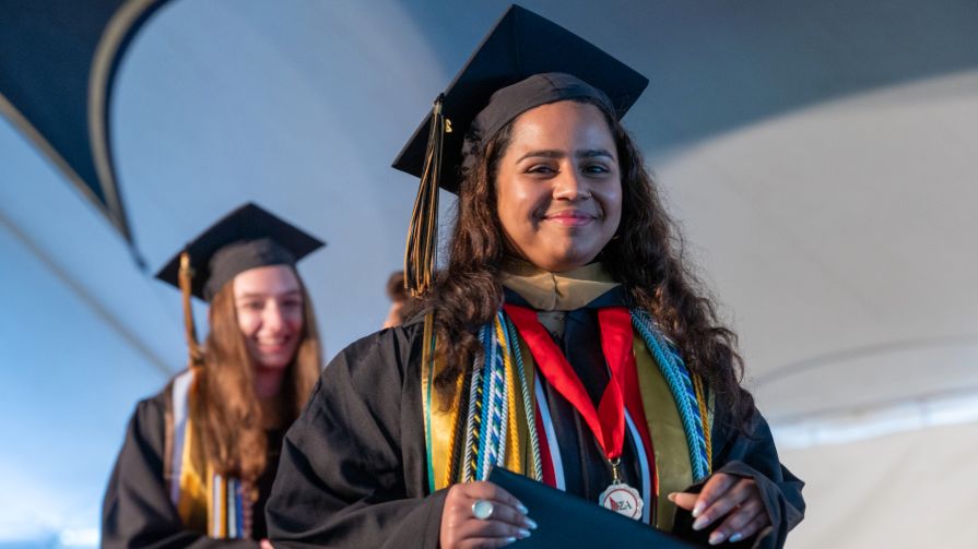 Bryant 2024 grad receives her diploma.