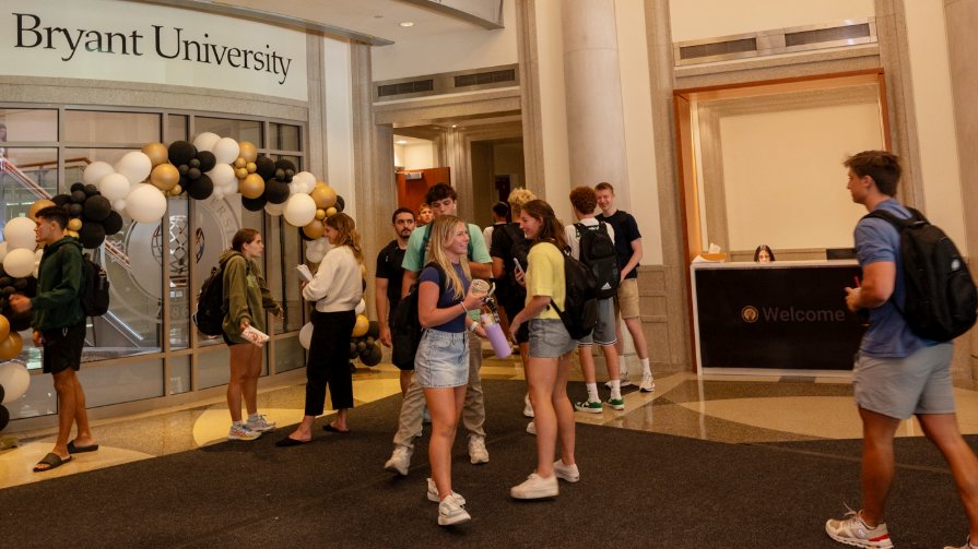 Students gather in the lobby of Bryant's new Business Entrepreneurship Leadership Center on opening day.