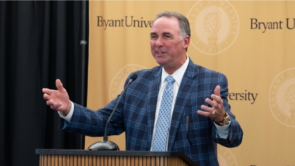 Joe Puishys ’80, vice chair of Bryant’s Board of Trustees and campaign co-chair, addresses his fellow Bryant supporters. 