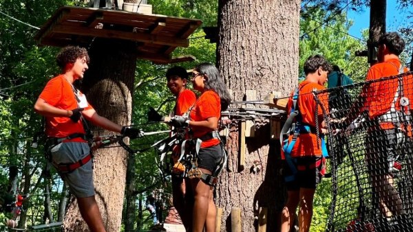 Bryant University 4MILE students visit a ropes course