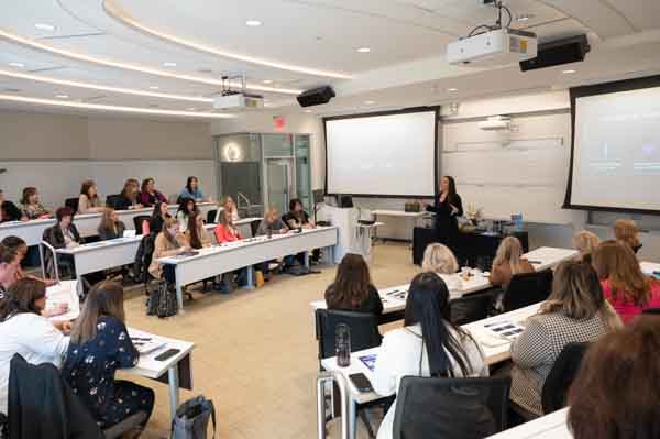 Bryant University Professor of Marketing Stefanie Boyer, Ph.D., leads a breakout session on powerful conversations