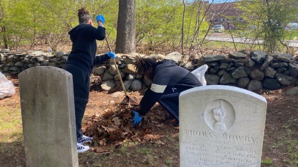Bryant students clean up Smithfield gravesite.