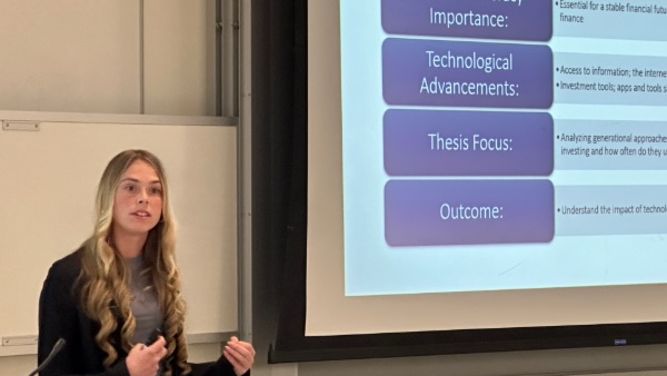 Bryant student Hannah O'Brien presenting her honors thesis