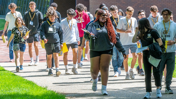 Orientation leaders walking with first-years