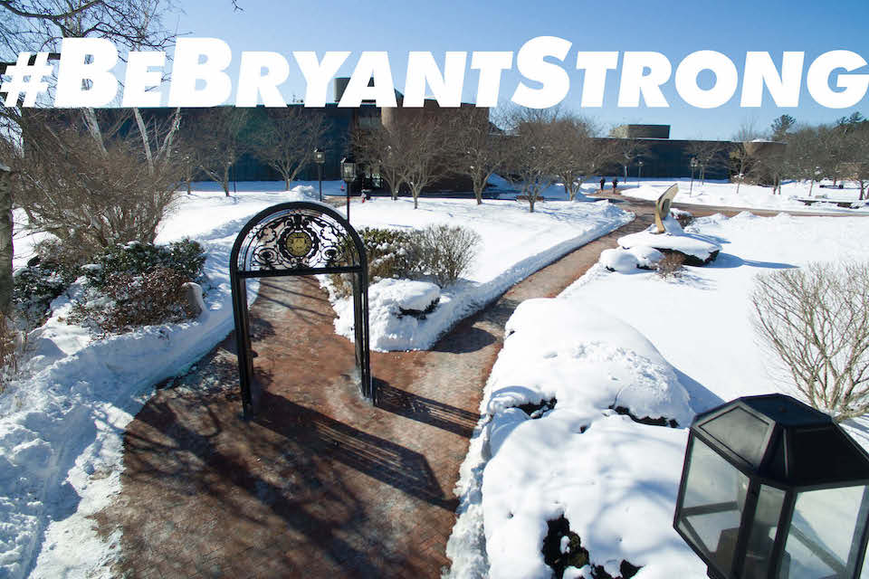 Snow-covered campus scene featuring Archway